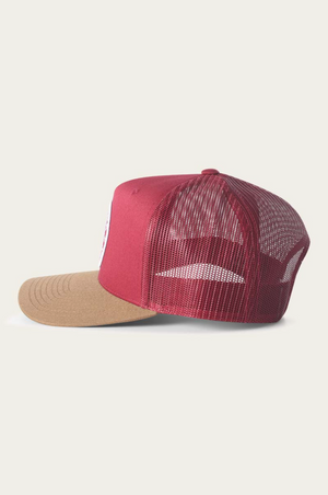 The Ringers Western Signature Bull Trucker Cap, in red and beige, features a red front panel, curved beige brim, mesh back for ventilation, and an adjustable strap for a perfect fit. Its simple and casual design makes it versatile and comfortable.