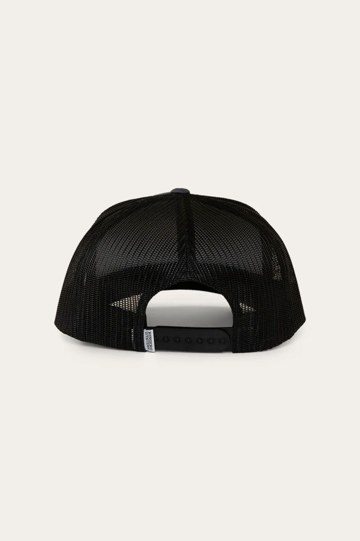 The Ringers Western Signature Bull Trucker Cap is shown from the back in black mesh, featuring an adjustable snapback closure, cotton twill front panels, and a small white Ringers Western tag on the side.