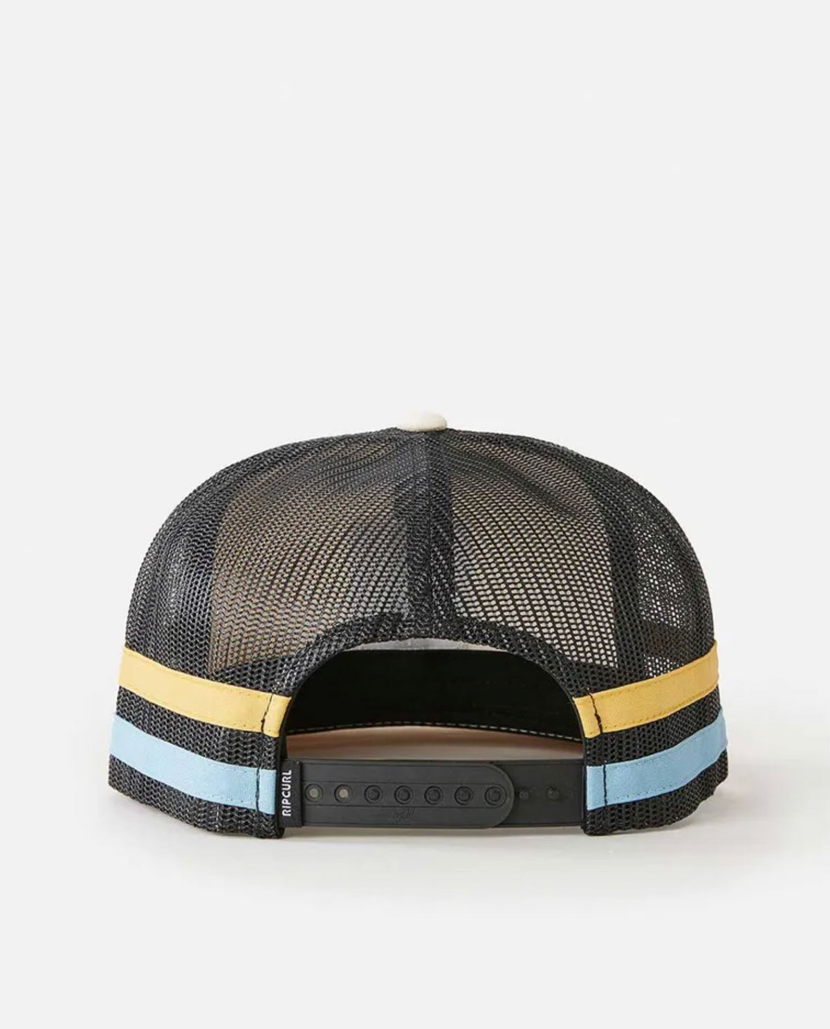 The Rip Curl Surf Revival Trucker hat features a mesh back, black adjustable snap closure, blue and yellow stripes on the brim, and an embroidered patch logo.