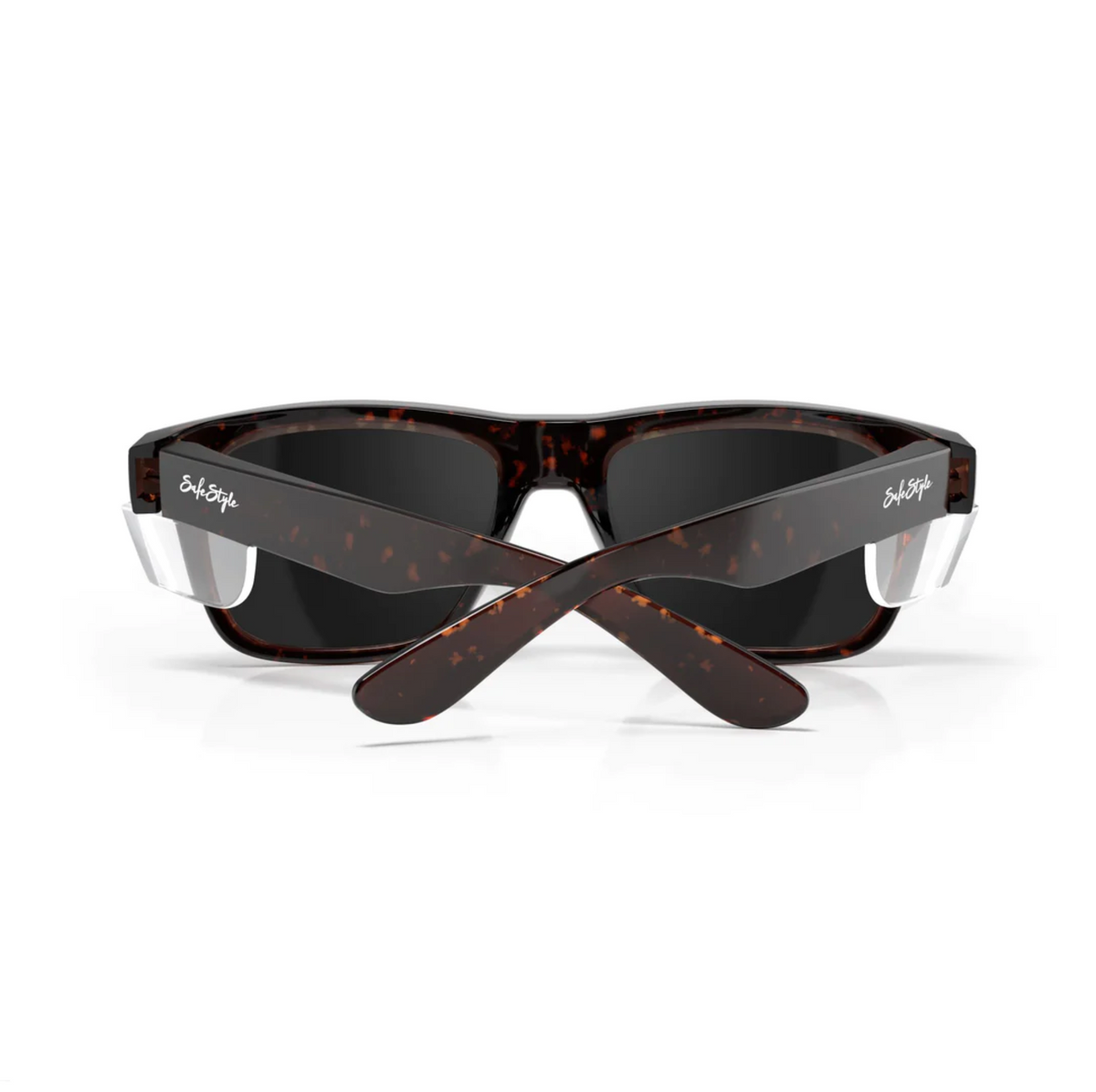 A pair of SafeStyle Fusions Brown Tort Frame Polarised Lens sunglasses, seen from the back with crossed arms. The brand name is printed in white on the arms.