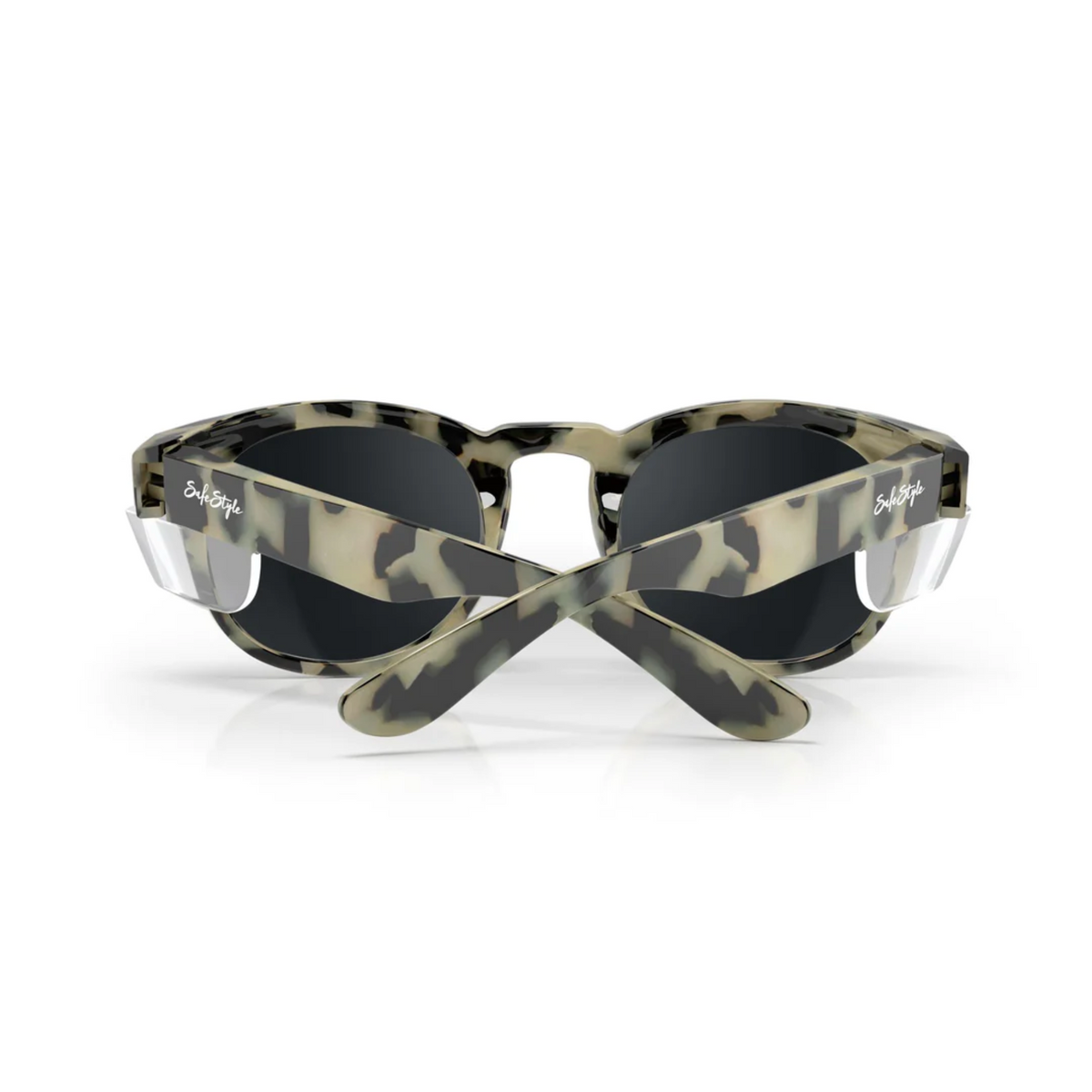 The SafeStyle Cruisers feature a milky tort frame with polarised black lenses. Crossed arms display the "Subspace" logo on each side, combining stylish looks with UV protection.