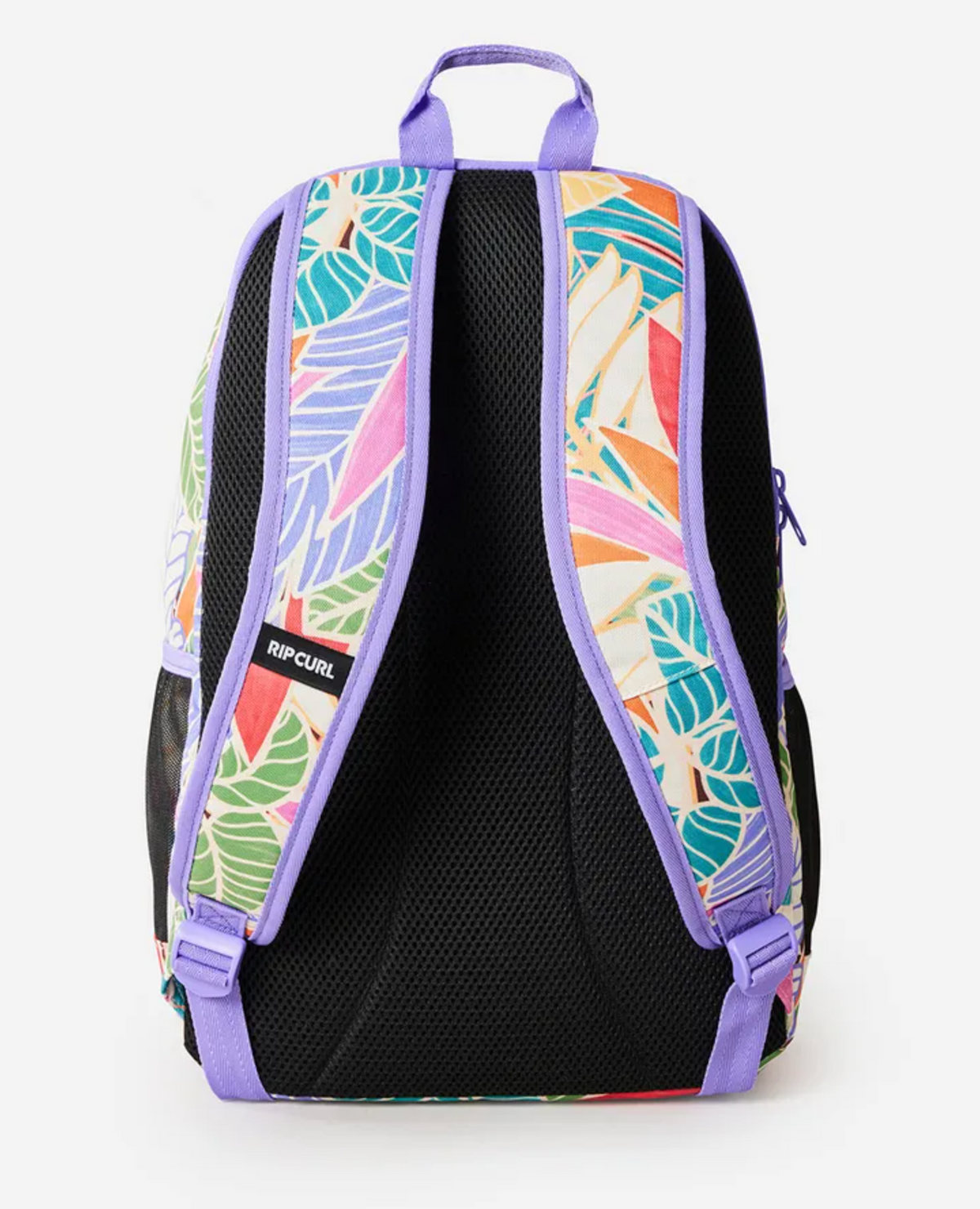 The Rip Curl Ozone 2.0 30L Backpack features a green, pink, blue, and orange tropical leaf print, purple straps, a black padded back, recycled polyester material, a laptop section, and a small "Rip Curl" label. Shown from the back.