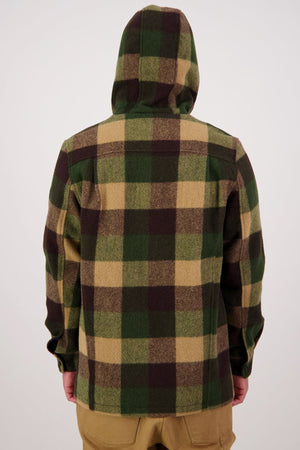 A person wearing a green, brown, and tan plaid Swanndri Hudson Hoodie stands with their back to the camera against a plain light background. This durable hoodie is made from premium New Zealand wool.