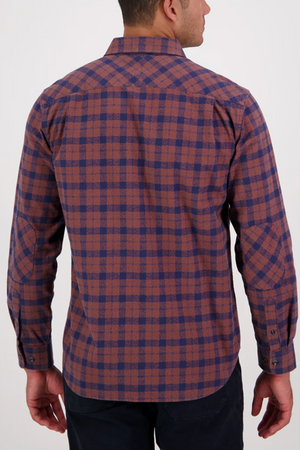 A man, seen from behind against a plain background, wears a Swanndri Port Road Shirt—long-sleeve, relaxed fit, cotton twill button-up in brown and blue yarn-dyed check—with his arms by his sides.