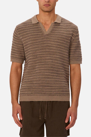 A man wearing the Industrie The Matera Polo in brown heavyweight knit.
