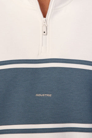 Close-up of the Industrie The Tech Southend Track Top, featuring white and blue horizontal stripes, "INDUSTRIE" branding on the blue section, a visible collar, top zipper detail, and signature casual style.