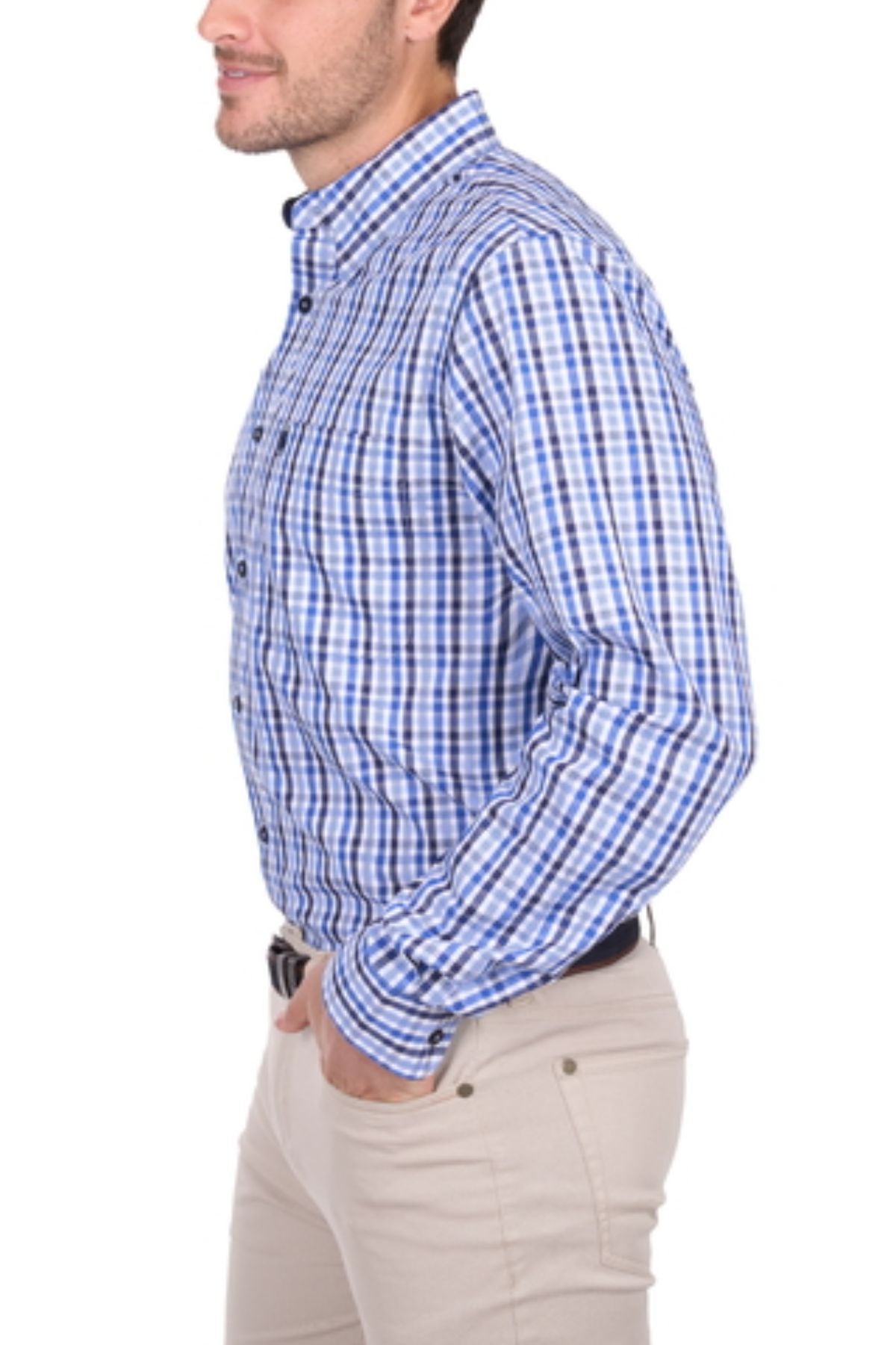 Wearing the Thomas Cook Andrew Shirt—blue and white checkered, cotton, long sleeve—a man stands in profile with one hand in his pocket and beige pants against a white background.