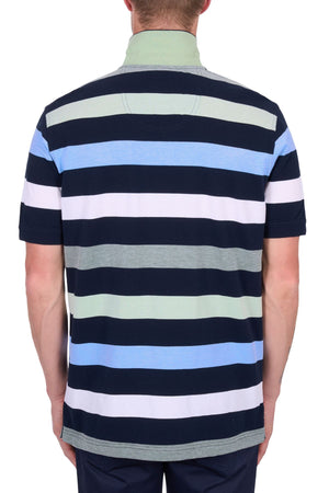 A person is seen from the back wearing the Thomas Cook Charles Polo, a 100% cotton pique polo with navy, white, light blue, green, and gray multi-colour stripes.
