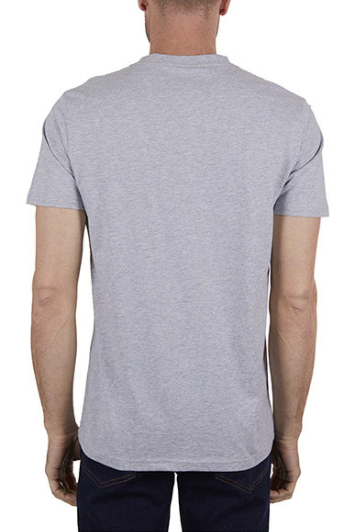 A person is seen from the back wearing the Thomas Cook Coach Tee in plain light gray cotton jersey with dark pants, set against a white background.