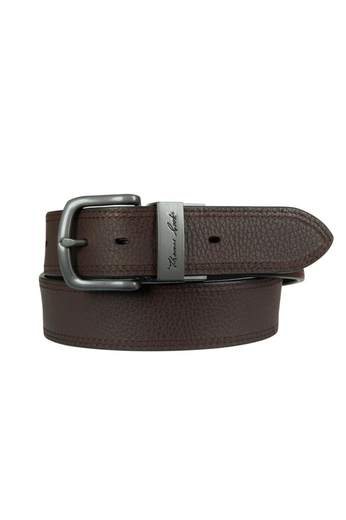 The Thomas Cook Denver Reversible Belt is a genuine leather accessory with a textured brown finish, silver buckle, and engraved metal detail. Presented rolled up neatly with the pointed end facing outward.