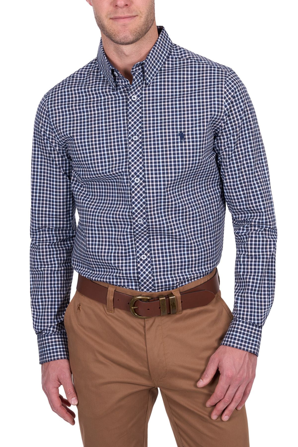 A man wearing the Thomas Cook Jason Tailored Shirt, a blue and white checkered long sleeve, tucked into tan pants with a brown belt, stands against a white background. His head is partially cropped out of the image.