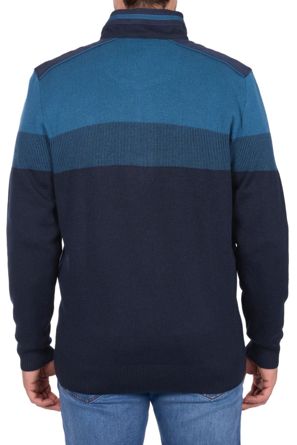 A person is seen from the back, wearing a blue and navy Thomas Cook Jerry 1/4 Zip Jumper with blue jeans against a white background.