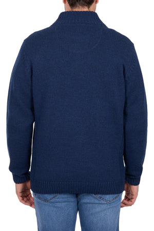 A person wearing a Thomas Cook Jesse 1/4 Zip Jumper in dark blue wool and light blue jeans, shown from the back against a white background.