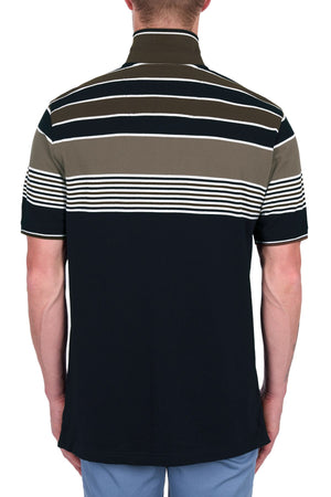 A man is seen from behind in a Thomas Cook Josua Polo, a short-sleeve striped 100% cotton pique shirt, paired with light blue pants against a plain white background.