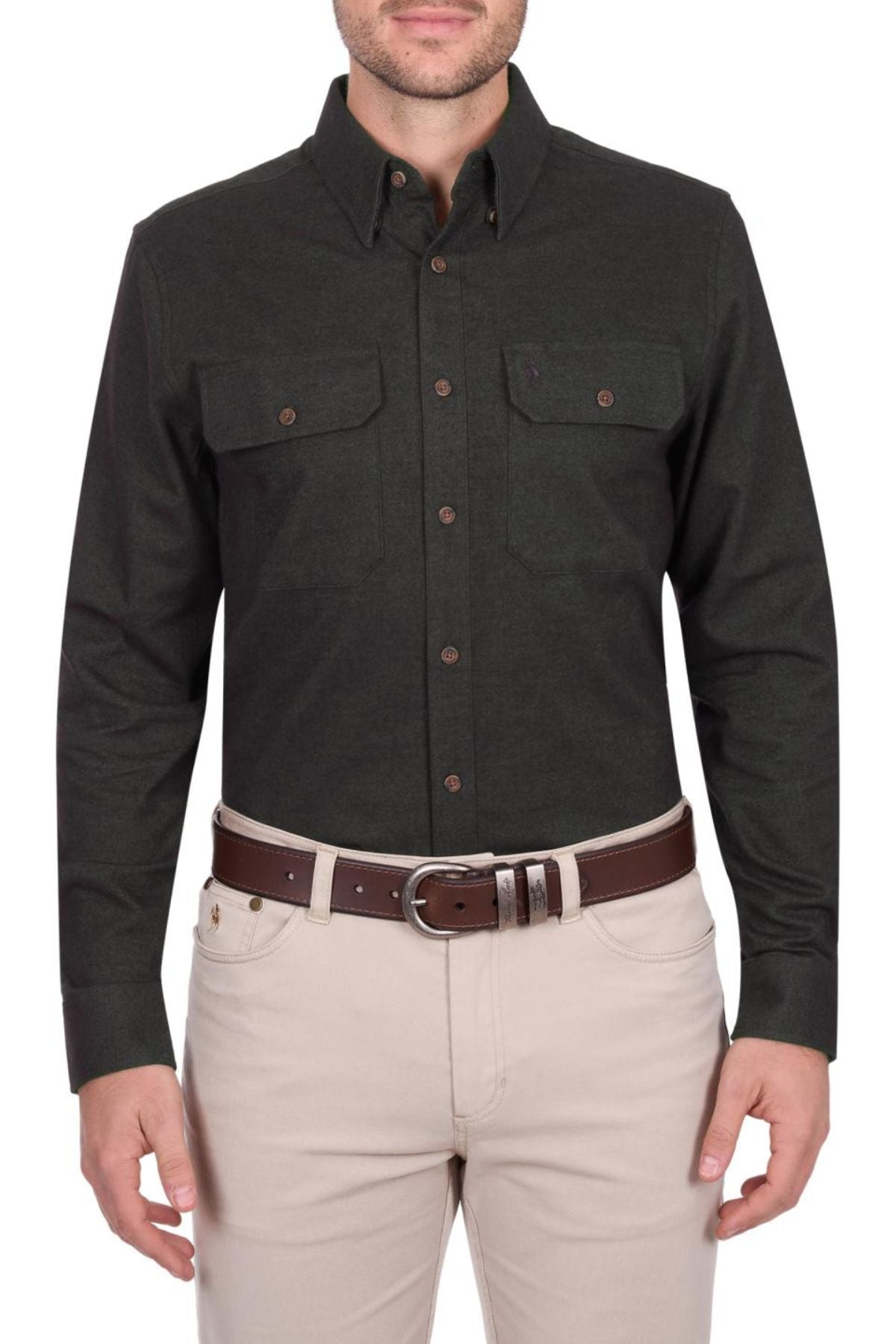A man wearing a Thomas Cook Keith Thermal Shirt with two chest pockets and light beige pants, accessorized with a dark brown belt. The image captures him from shoulders to hips.