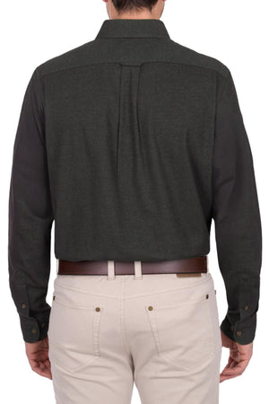 A person shown from the back wears a dark Thomas Cook Keith Thermal Shirt with a back pleat, tucked into light-colored pants featuring back button-flap pockets and a brown belt.