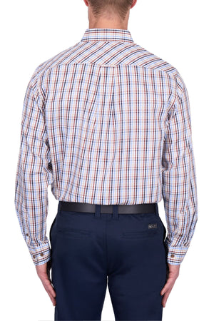 A man is seen from the back wearing a Thomas Cook Scott Shirt, a long-sleeve, 100% cotton multicolored plaid shirt, tucked into navy trousers with a black belt against a white background.