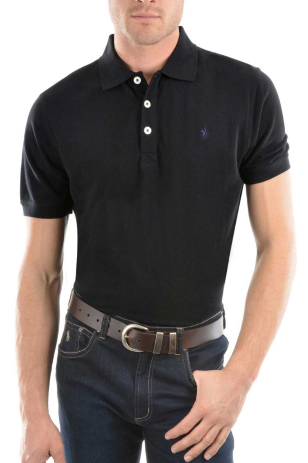 A man wears the Thomas Cook Tailored Polo—black, slim fit with white buttons—paired with dark blue jeans and a brown leather belt, standing against a plain white background. His face is partially out of frame.