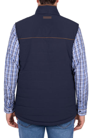A person is shown from the back against a white background wearing a blue checkered shirt, blue jeans, and the Thomas Cook Toby Revs Vest in navy.
