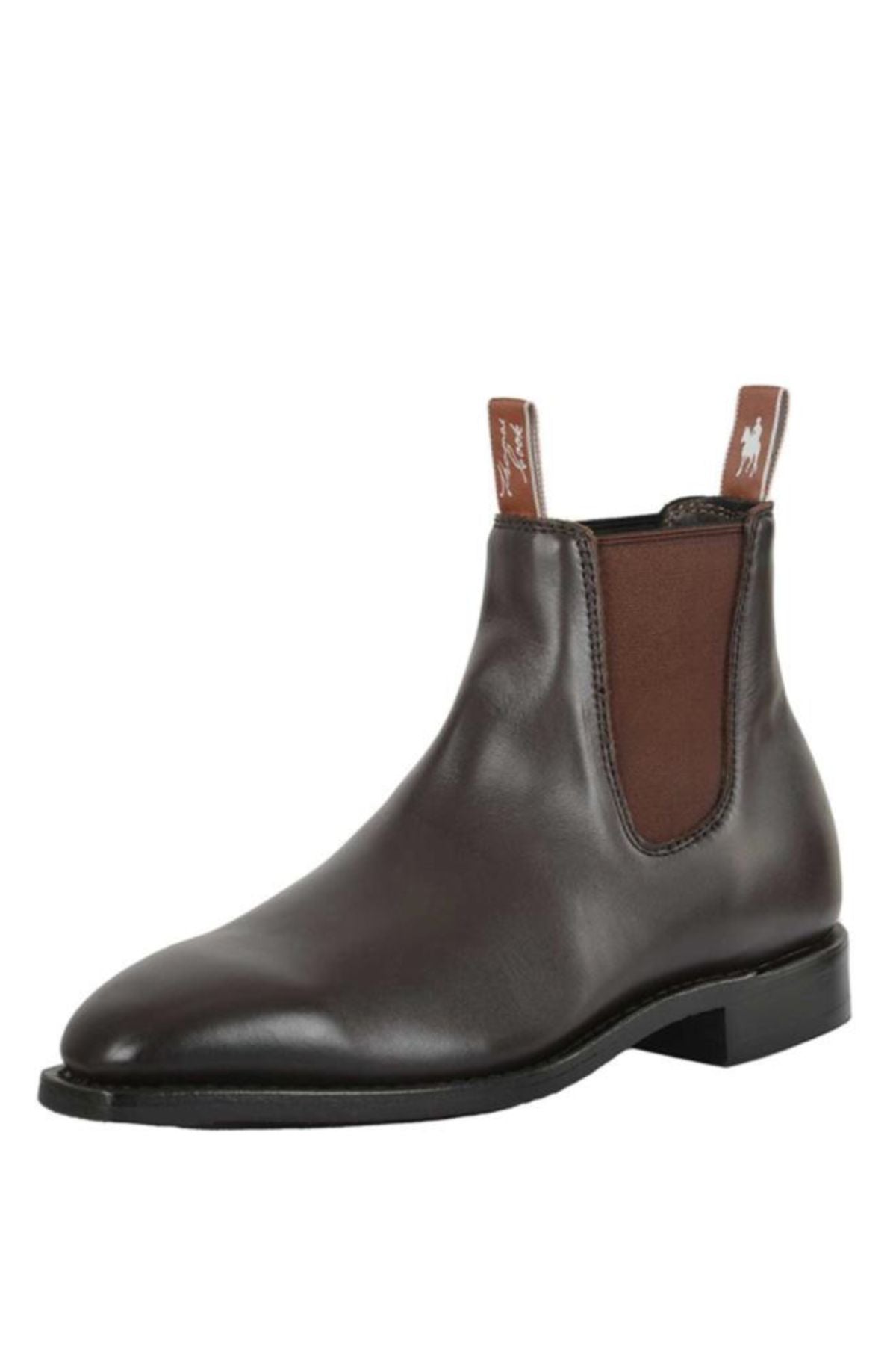 The Thomas Cook Trentham Cushion Tech Dress Boot is a dark brown premium leather Chelsea boot made in Australia, featuring elastic side panels, a low heel, and brown pull tabs with white logos at front and back.