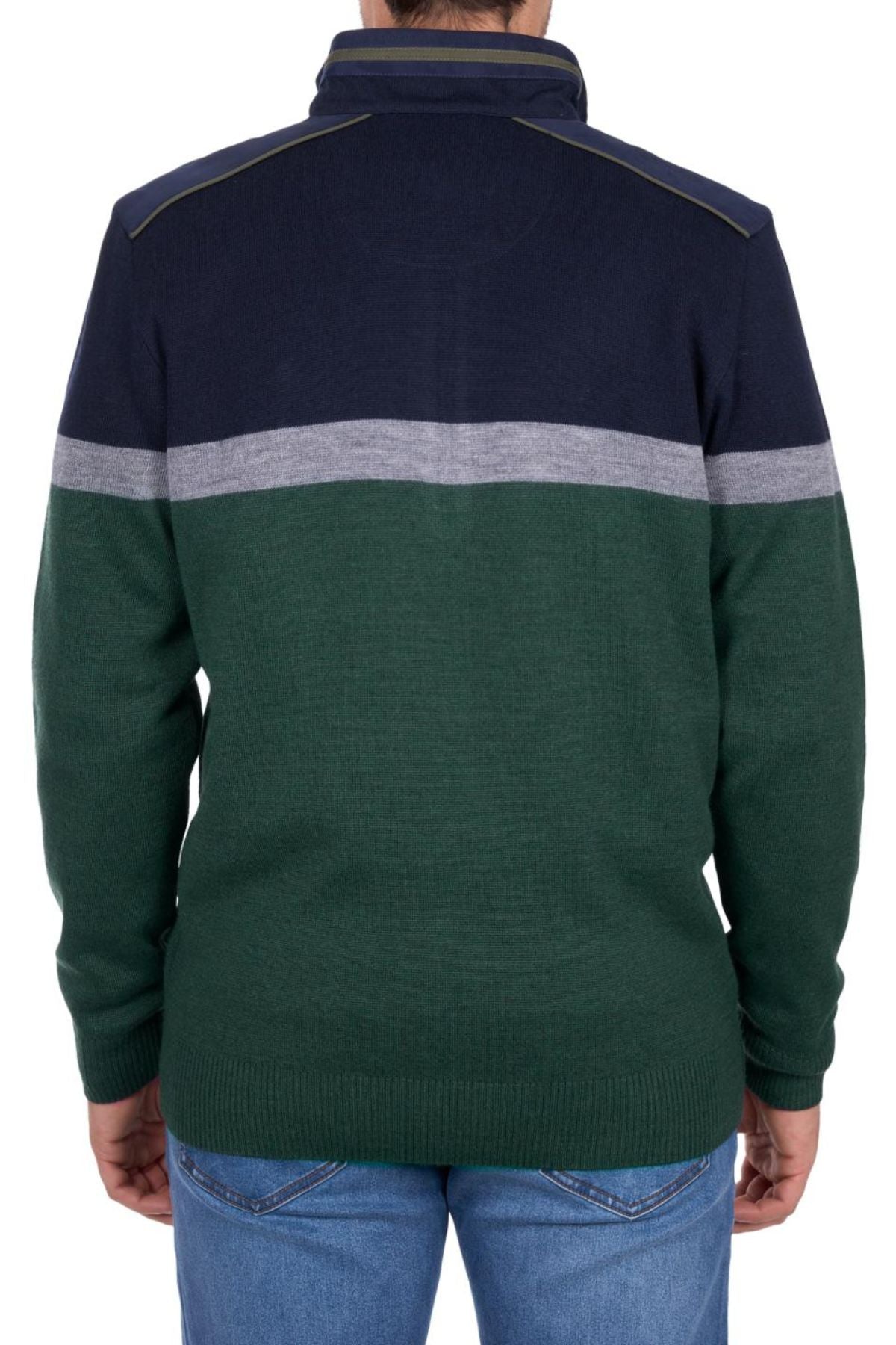 A person is seen from behind, wearing a Thomas Cook Troy 1/4 Zip Jumper with a navy blue top, gray horizontal stripe, and green bottom, paired with blue jeans. The photo captures them from shoulders to hips.