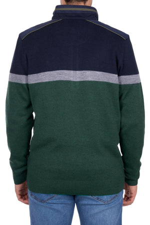 A person is seen from behind, wearing a Thomas Cook Troy 1/4 Zip Jumper with a navy blue top, gray horizontal stripe, and green bottom, paired with blue jeans. The photo captures them from shoulders to hips.