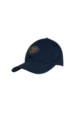 The Thomas Cook Heritage Cap is a navy blue baseball cap with a curved brim and adjustable strap, featuring a brown and tan patch with text and graphic on the front, shown on a white background.