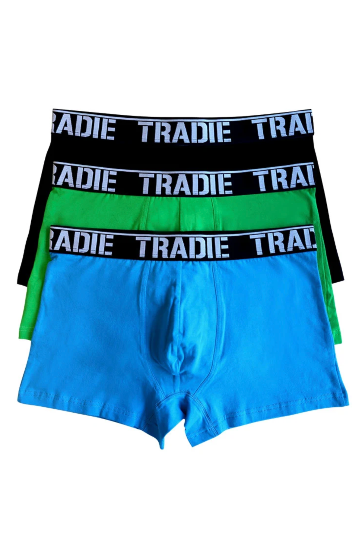 The Tradie Mens 3PK Trunk includes three pairs of trunks in black, green, and blue, each with a black waistband featuring bold white "TRADIE" lettering. Made from cotton elastane for comfort.