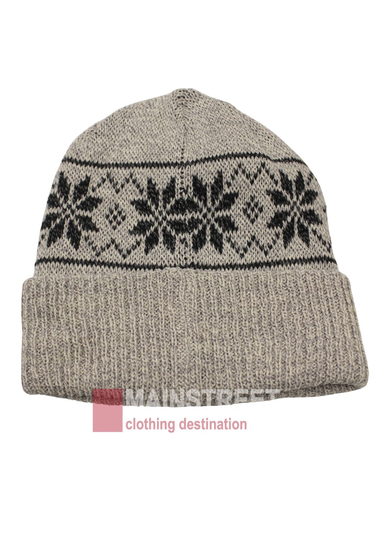 The Anticorp Pattern Beanie is a knitted beige hat with black snowflake designs and a folded brim, ideal for upgrading your winter look. Shown on a white background.