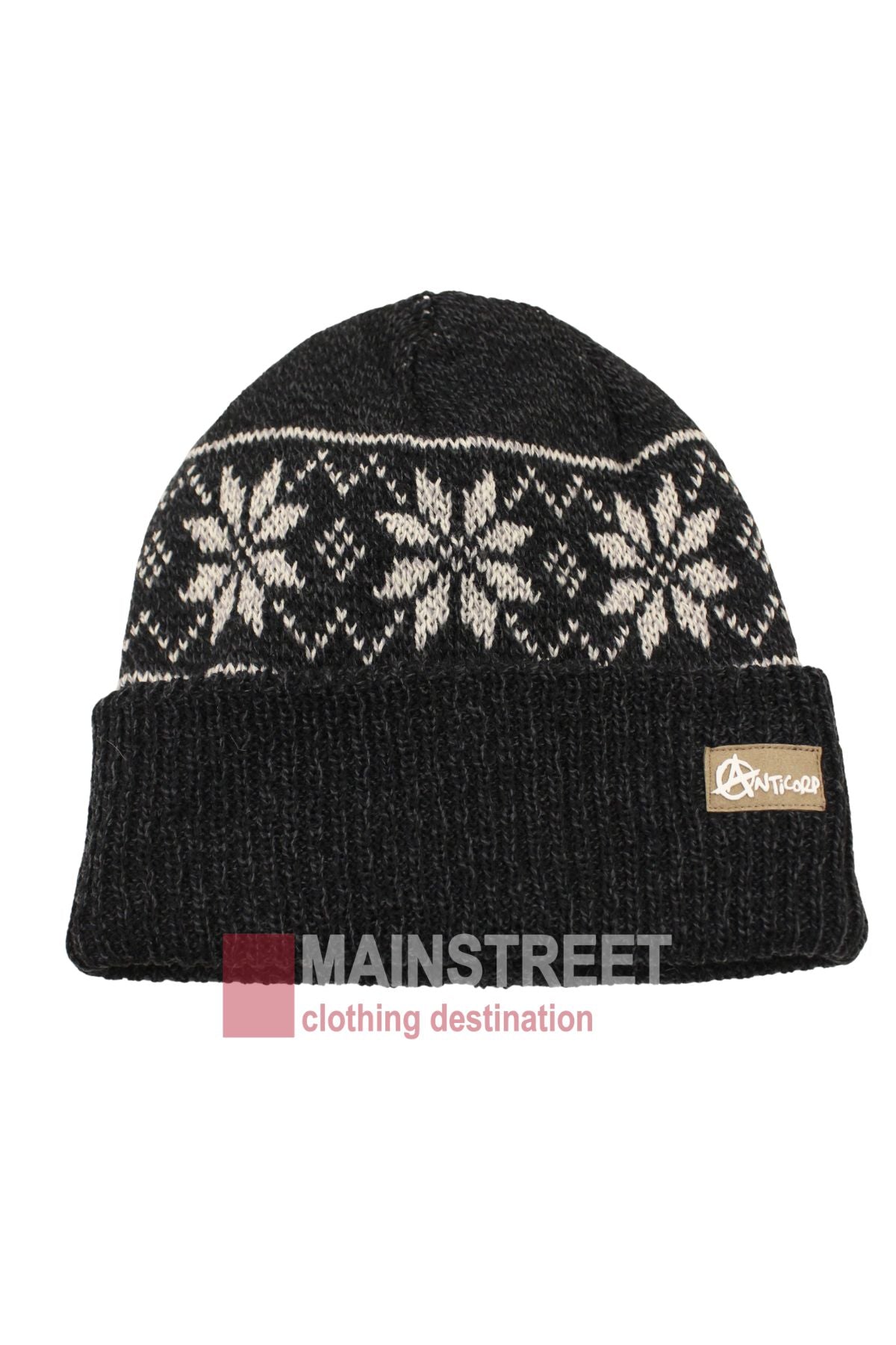 The Anticorp Pattern Beanie is a black knit hat with a white snowflake design around the crown and a folded brim with a small rectangular brand patch—perfect for your winter wardrobe.