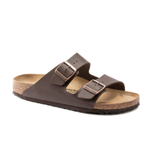 The Birkenstock Arizona Birko-Flor Regular sandal in brown features two adjustable metal buckles, a Birko-Flor upper, cork-latex footbed, black rubber sole, and is photographed against a white background.