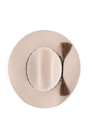 The Avenel The Pickup Rider Fur Felt Hat is a beige wide brim hat, seen from above, with a braided band and two decorative brown tassels on one side.