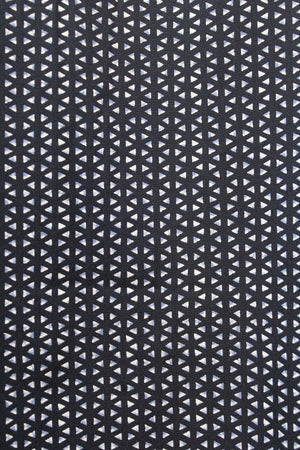 The Back Bay Bamboo Soft Touch Print Short Sleeve Shirt features a striking geometric pattern of white and light purple triangles on black, crafted from a soft polyester-cotton blend for comfort and style.