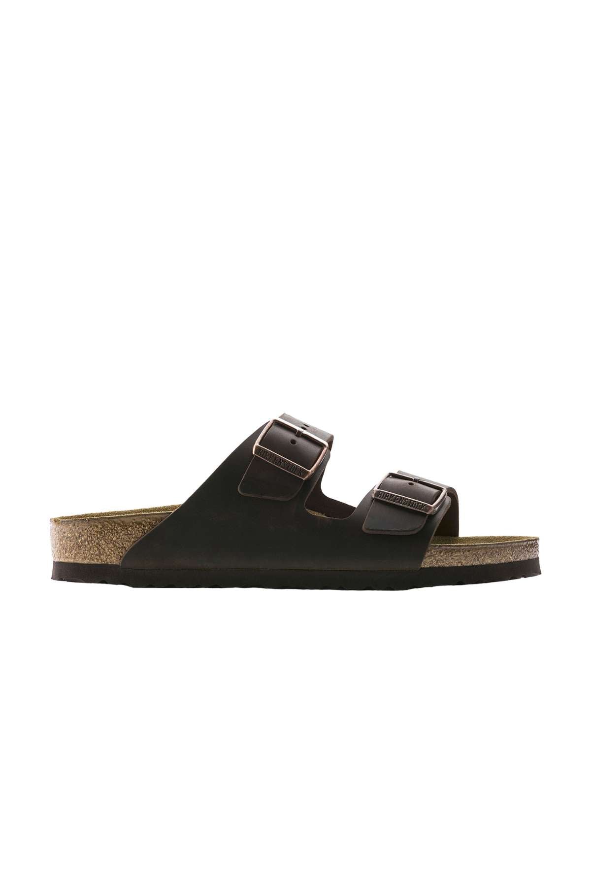 The Birkenstock Arizona is a black sandal designed for casual wear, featuring a cork sole and two wide straps across the top. Each strap is equipped with an adjustable dark metal buckle, and the inside sole is contoured for optimal comfort.