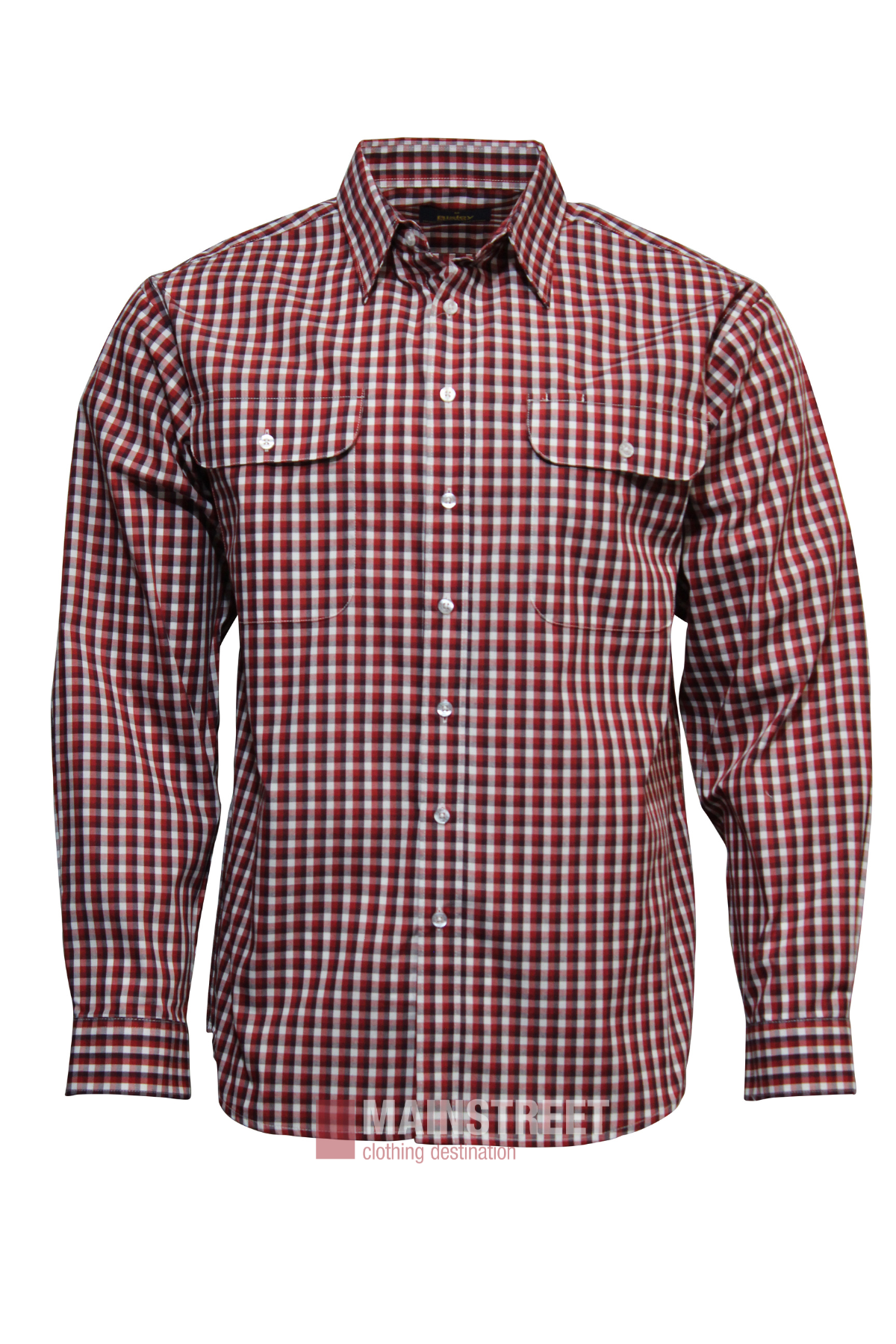 The Bisley Countryman Shirt offers a durable polyester-cotton blend with a red, white, and black check pattern. It features long sleeves, a pointed collar, and two chest pockets with button flaps for classic style and practicality.