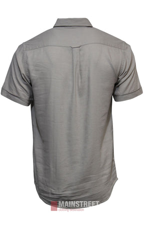 The Bridgeport Linen Blend Short Sleeve Shirt is a men’s casual top in light gray, shown from the back on a white background. It features a collar and straight hem for a classic, timeless look.
