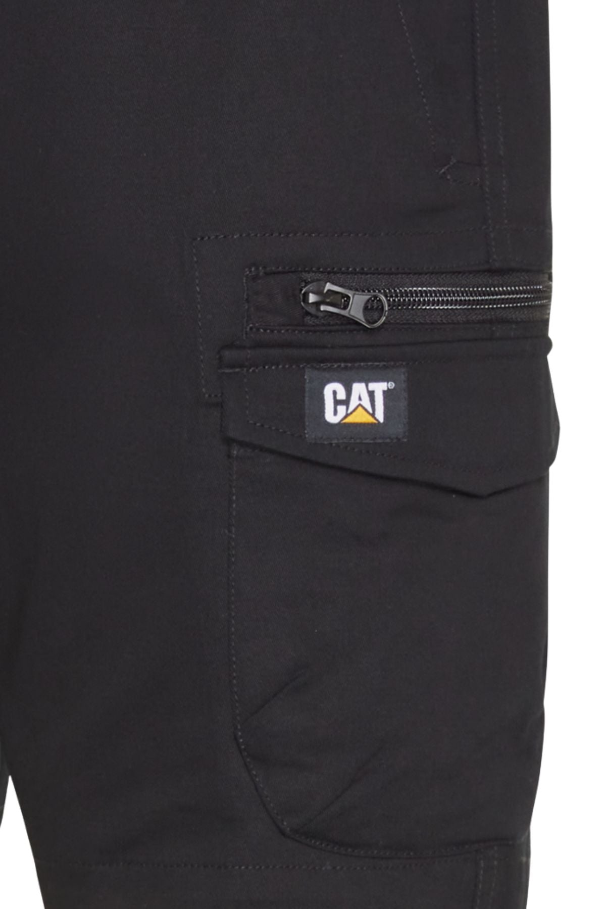 Close-up of a black pocket with a visible zipper and yellow-and-white CAT logo patch on durable CAT Diesel Short 2.0, showcasing its quality.
