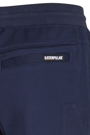 Close-up of the back pocket on navy blue CAT Diesel Short 2.0, showing a rectangular Caterpillar label above the pocket.