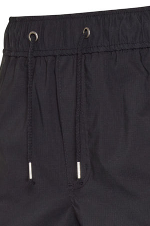 Close-up of the CAT Hydraulic Short waistband, featuring an elastic drawstring with metal tips, two metal-reinforced eyelets, and subtly textured fabric.