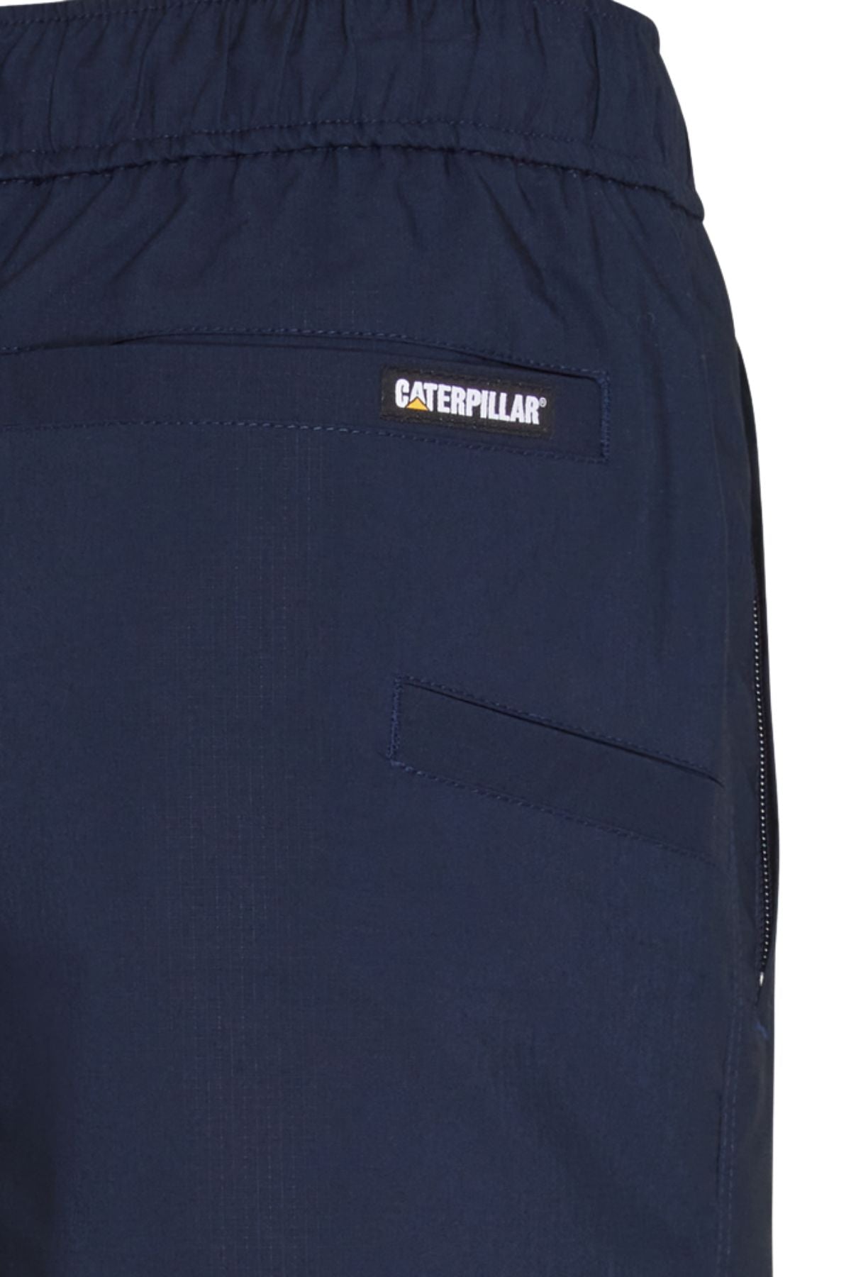 Close-up of CAT Hydraulic Short work shorts in navy blue, featuring an elastic waistband, two pockets, and a small rectangular Caterpillar logo patch above one pocket.
