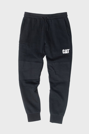 The CAT TM Fleece Track Pant features a black fleece design with an elastic waistband, drawstring, side pockets, ribbed cuffs, and bold CAT branding on the left thigh. Shown flat on a light gray background.