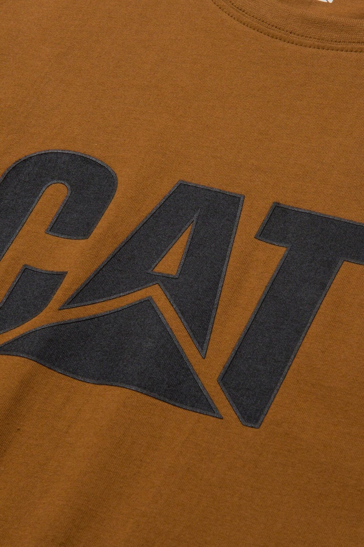 Close-up of the brown cotton CAT Trademark Logo Tee featuring a large, bold, black "CAT" print.