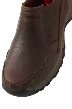 Close-up view of the Colorado Joao Casual Shoe, a brown slip-on with textured leather and fabric, visible stitching, and a rugged Sure Grip Outsole.