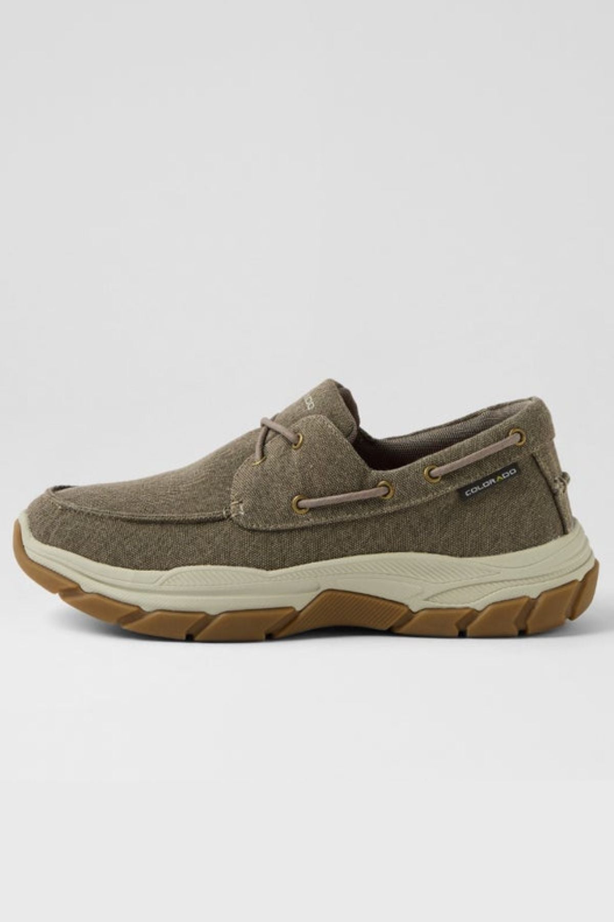 The Colorado Kanebo Canvas Shoe features a khaki canvas loafer design with brown laces, arch support, and a thick tan rubber sole, shown in side profile against a plain light background.