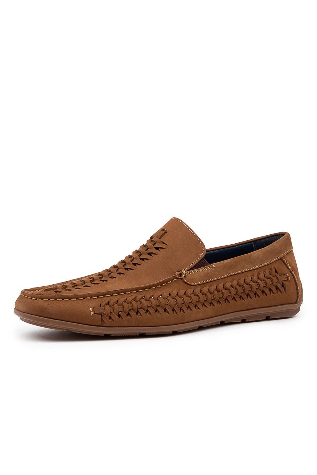 The Colorado Massar Casual Shoe is a brown woven leather loafer with intricate top and side detailing, low heel, and an easy slip-on design. Shown against a white background, it offers both style and comfort.