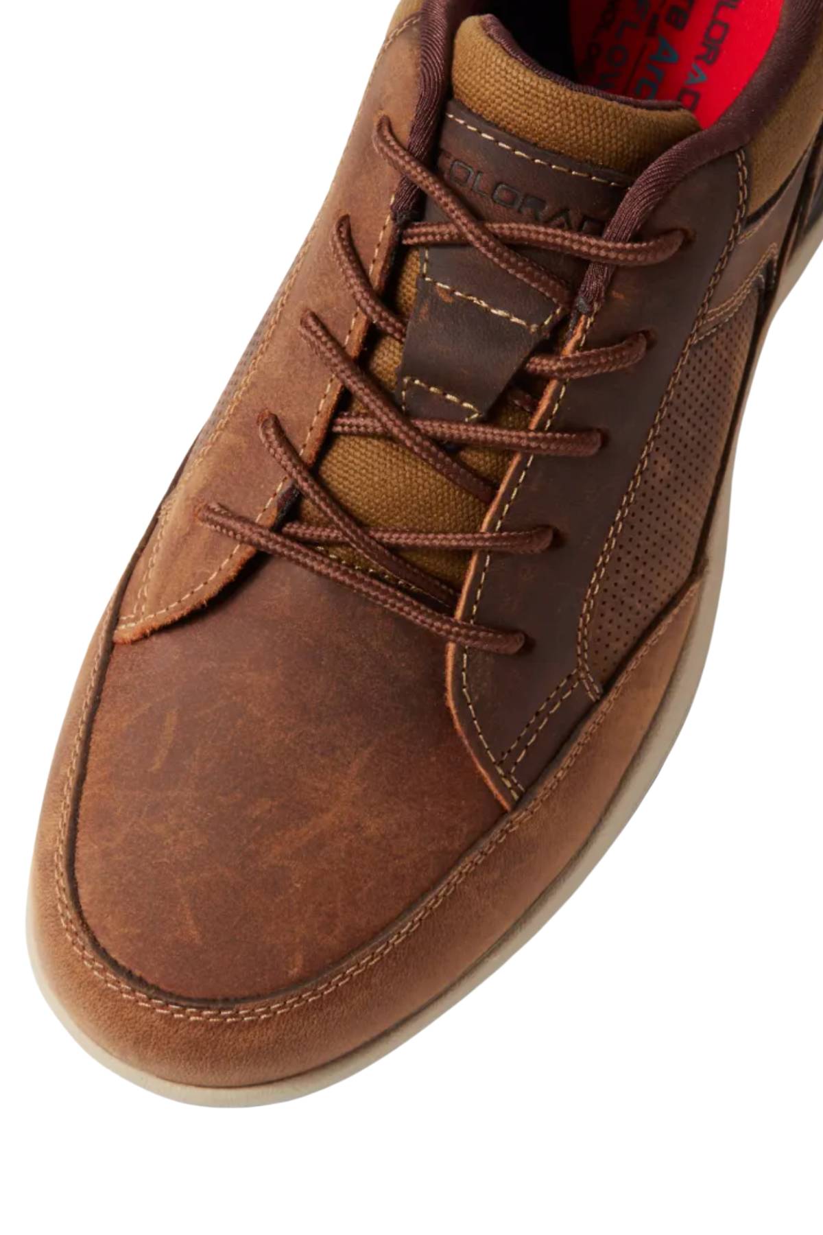Close-up of the Colorado Reach Lace Up Shoe, a brown men's leather casual with visible stitching, textured side panel, lace-up design, red insole, and a slightly worn finish for style and comfort.