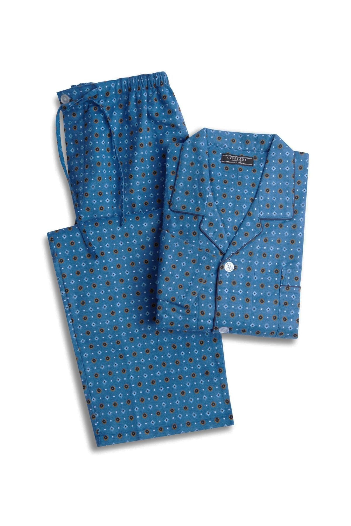 The Contare Country Winter Flannelette PJ Set, featuring a blue brushed cotton button-up top and drawstring pants with a brown and white dot pattern on light blue, is neatly displayed on a white surface.