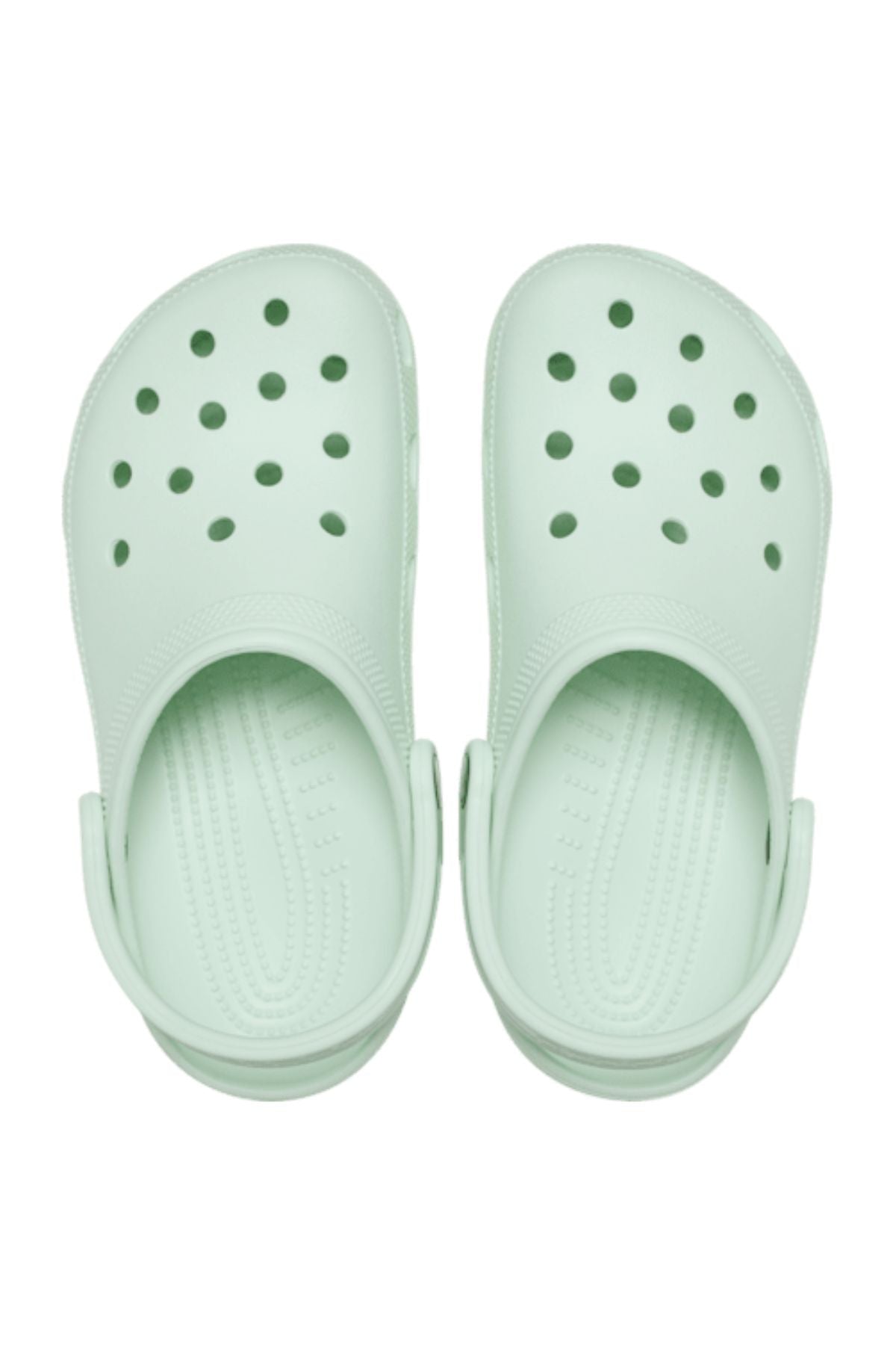 A pair of light green Crocs Classic Clog with ventilation holes and adjustable back straps, viewed from above on a white background. These lightweight clogs are ideal men's water shoes.
