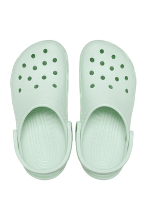 A pair of light green Crocs Classic Clog with ventilation holes and adjustable back straps, viewed from above on a white background. These lightweight clogs are ideal men's water shoes.