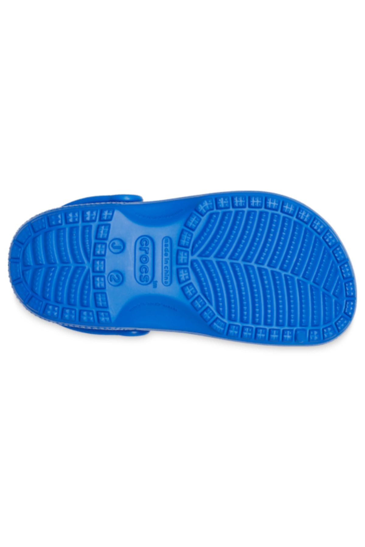 The underside of the Crocs Classic Kids Clog features a textured herringbone sole with the Crocs logo stamped in the center, offering signature Crocs Comfort for children’s feet.